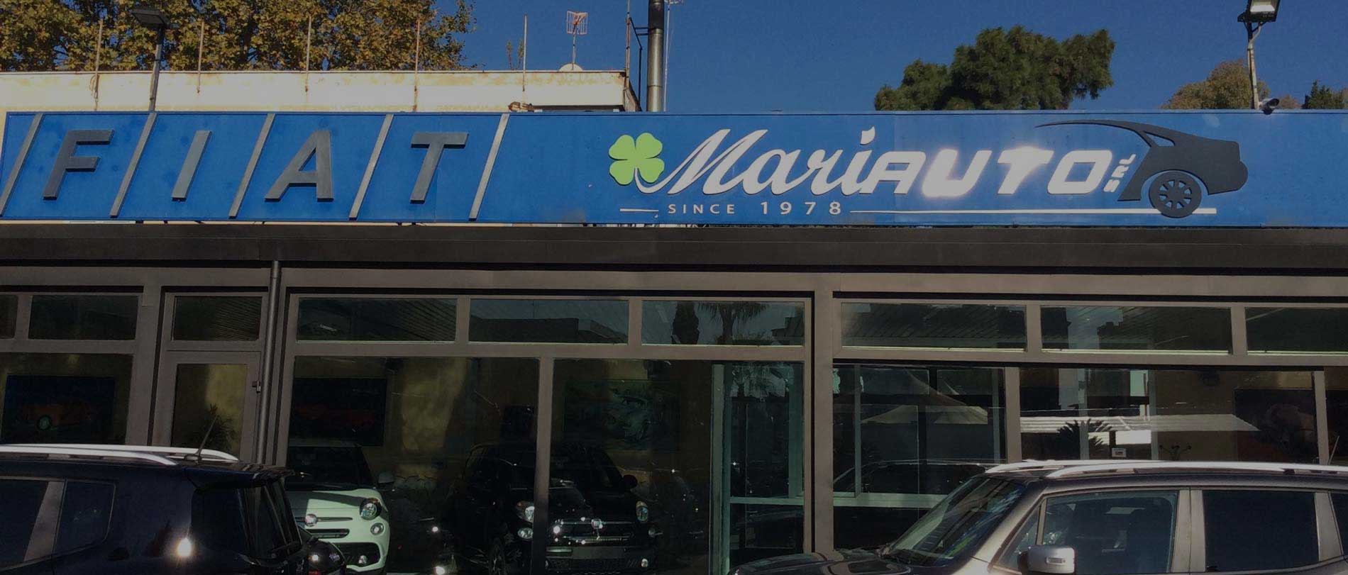 Insegna del concessionario Mariauto, dal 1978 a Napoli